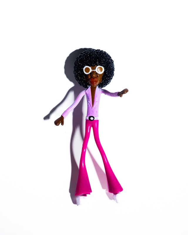 Wiggly Afro-Haired Doll Toy