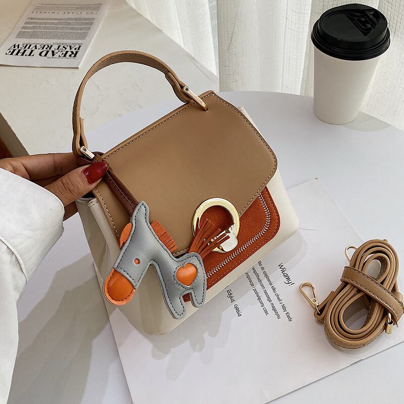 ネットレッドレディーススモールバッグ2020新しいトレンディな夏のファッションヒットカラーポータブルメッセンジャーバッグバージョンのワイルドバケットバッグ Tiancai_Wing_Bag9554205