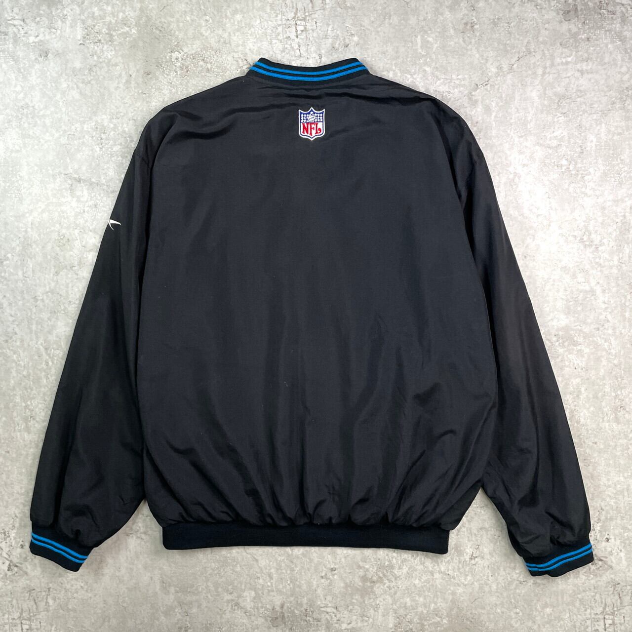 Reebok リーボック NFL カロライナ・パンサーズ ナイロン ジャケット Reebok リーボック NFLカロライナ・パンサーズ チームロゴ刺繍