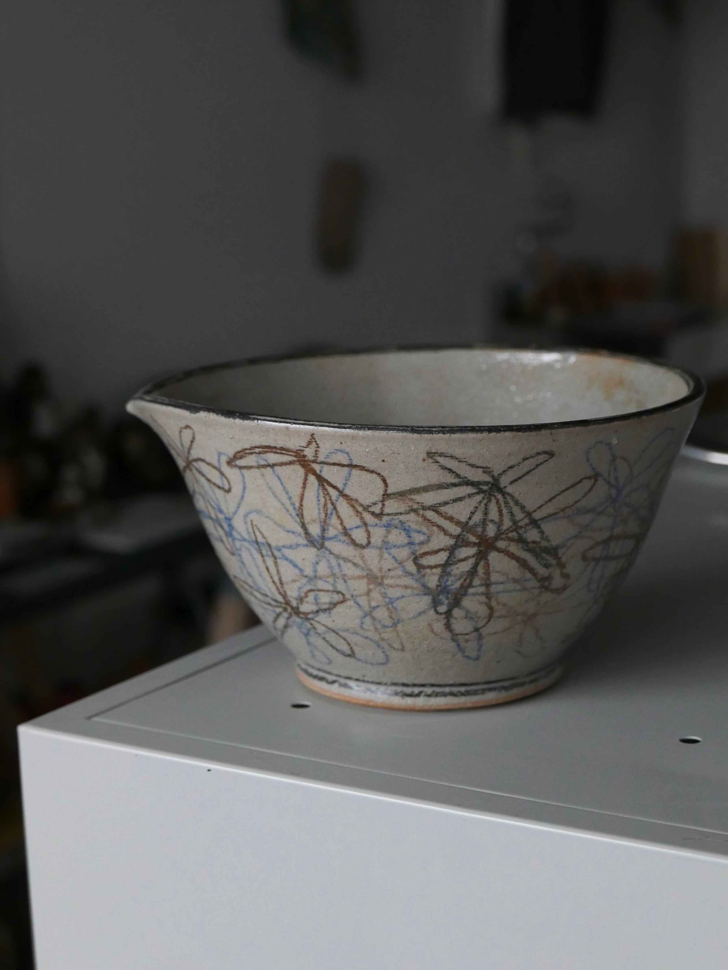 old spouted bowl , flower / hand painted