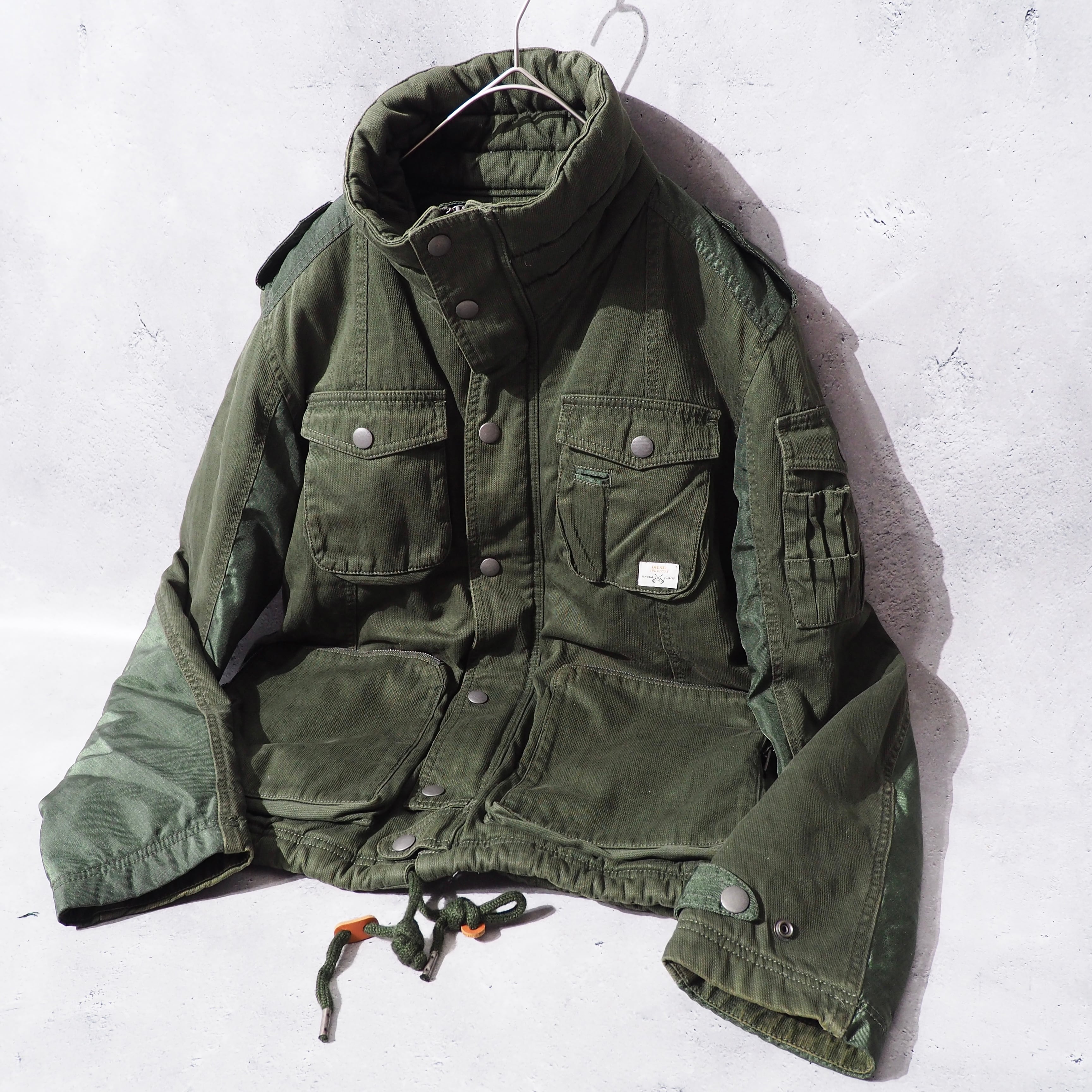 " DIESEL " Big Pockets × Switching nylon High neck Military jacket