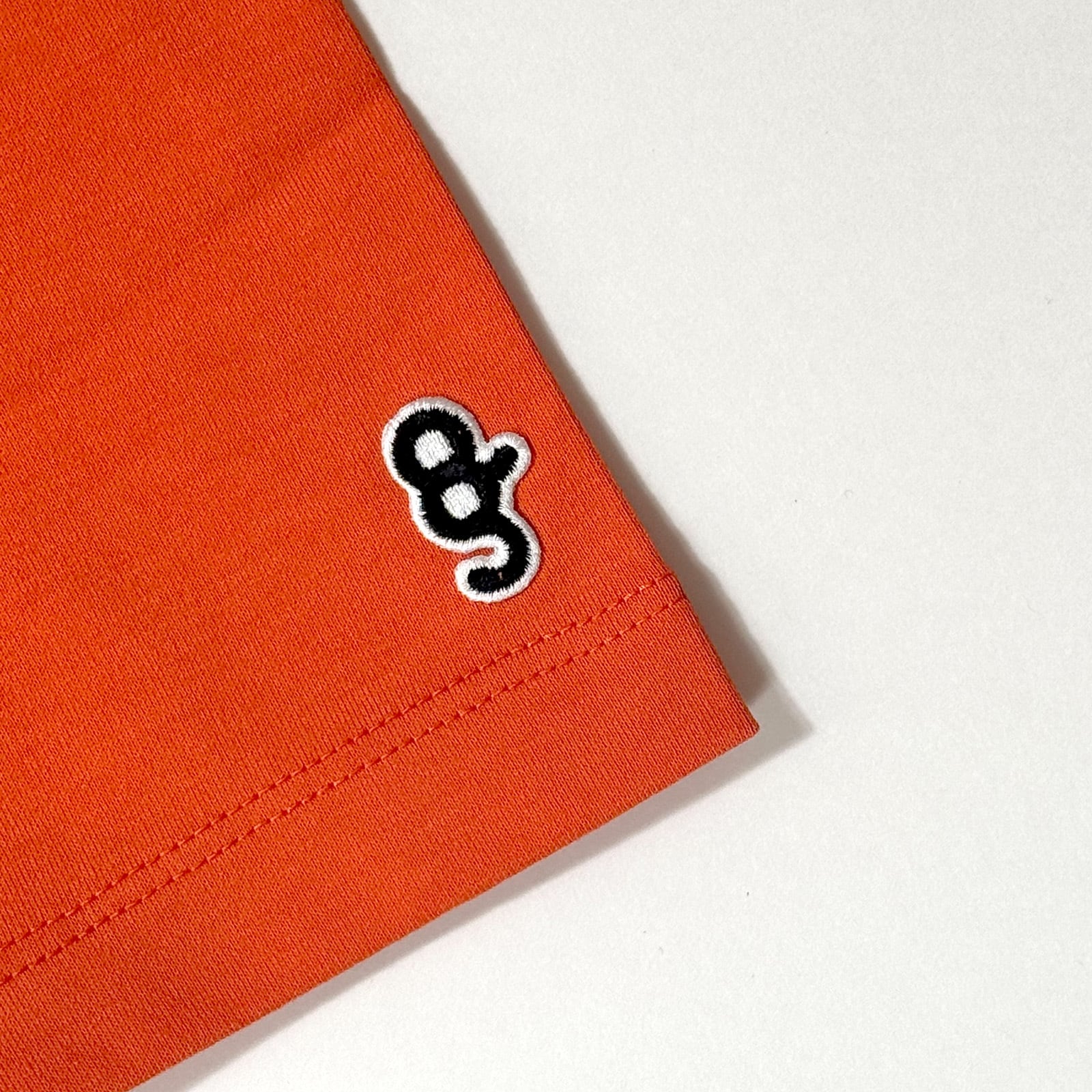 WOMENS】COLLEGE LOGO RELAX MOCK NECK TEE -ORANGE- | 8G SHOOT WEBSTORE