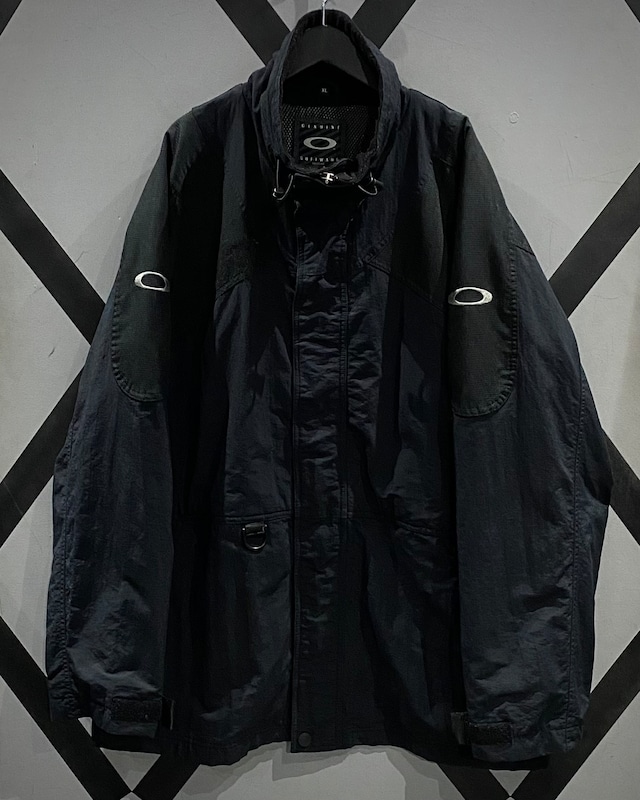 【X VINTAGE】“OAKLEY” Various Gimmick Loose Nylon Jacket