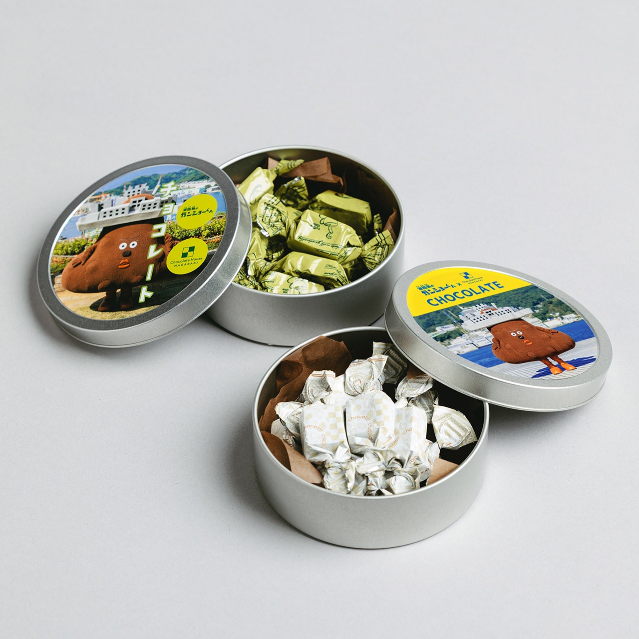 丸缶チョコレート　軍艦島のガンショーくんパッケージ　《きな粉味》