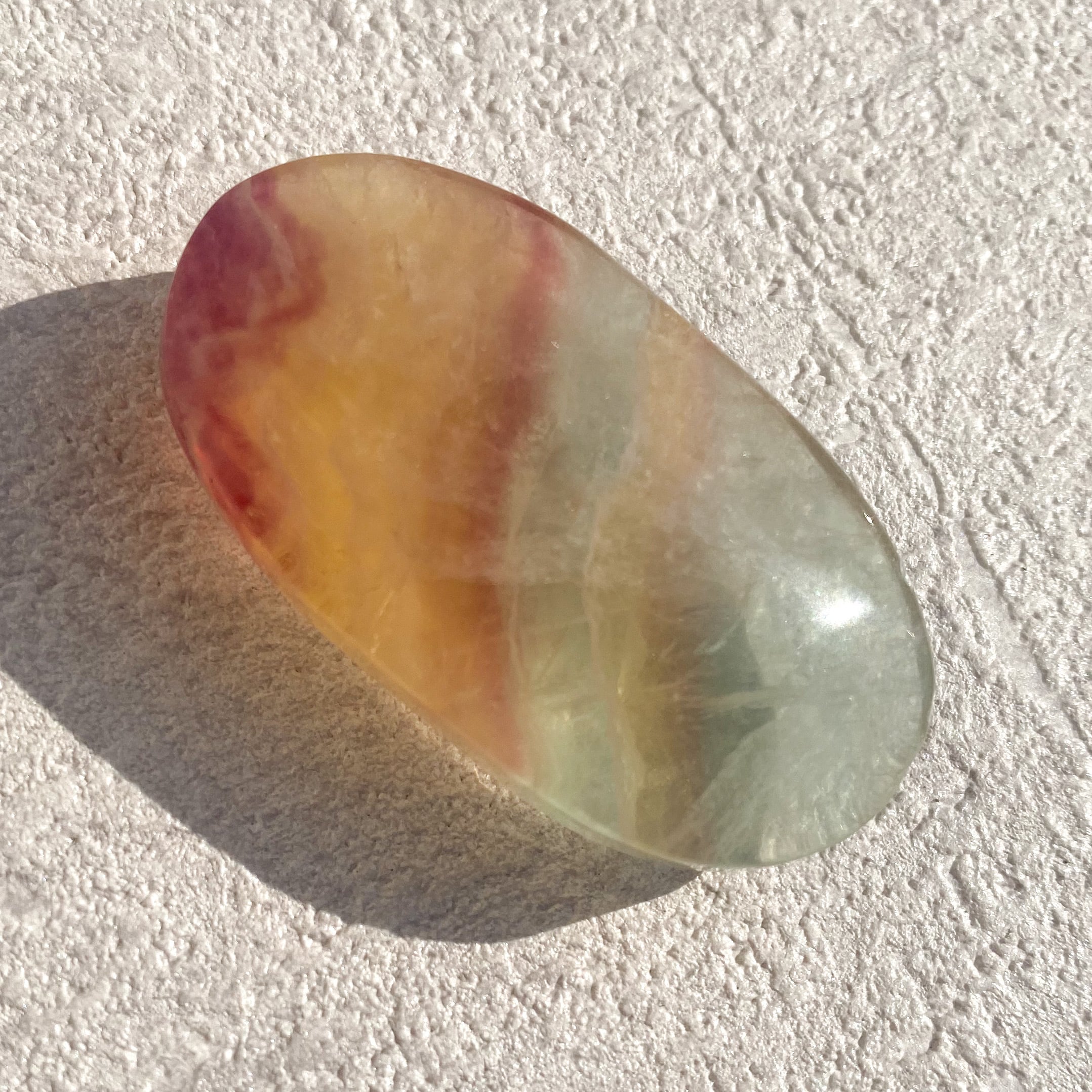 Candy fluorite palm stone