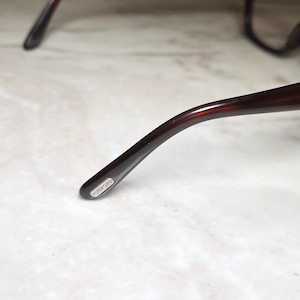 TOM FORD brown color frame glasses with clear lens