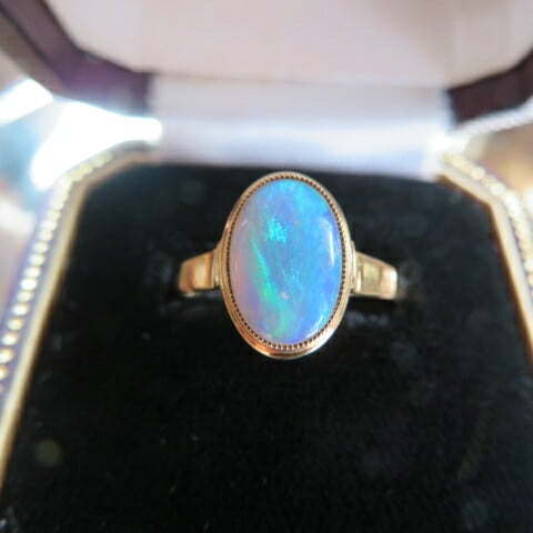 ヴィンテージ K18 光彩オパール覆輪留めリング