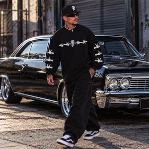 CHRIST GUN SLEEVE SIGN LOGO L/S TEE