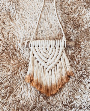 Bohemian macrame tapestry.