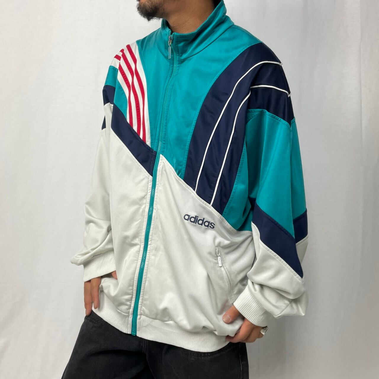 80年代 adidas アディダス ジャージ アシンメトリー ラインデザイントラックジャケット メンズ2XL相当 古着 80s ヴィンテージ  ビンテージ エメラルドグリーン ホワイト ネイビー 緑色 白 紺色 ロゴ刺繍 ビッグサイズ 大きいサイズ【ジャージ・トラックジャケット】 | cave 