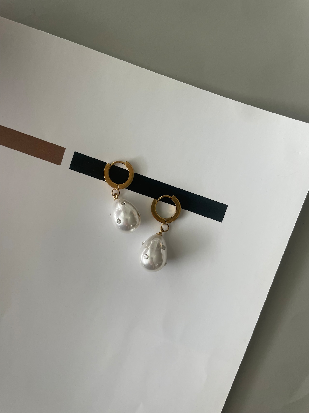 milky teardrop pierce