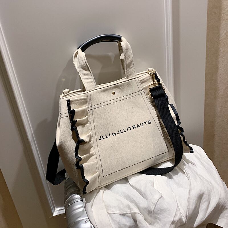 バッグレディースバッグ2020夏の新しい潮ネットレッド大容量野生のハンドバッグショルダーバッグファッションキャンバストートバッグ Tiancai_Wing_Bag8353838