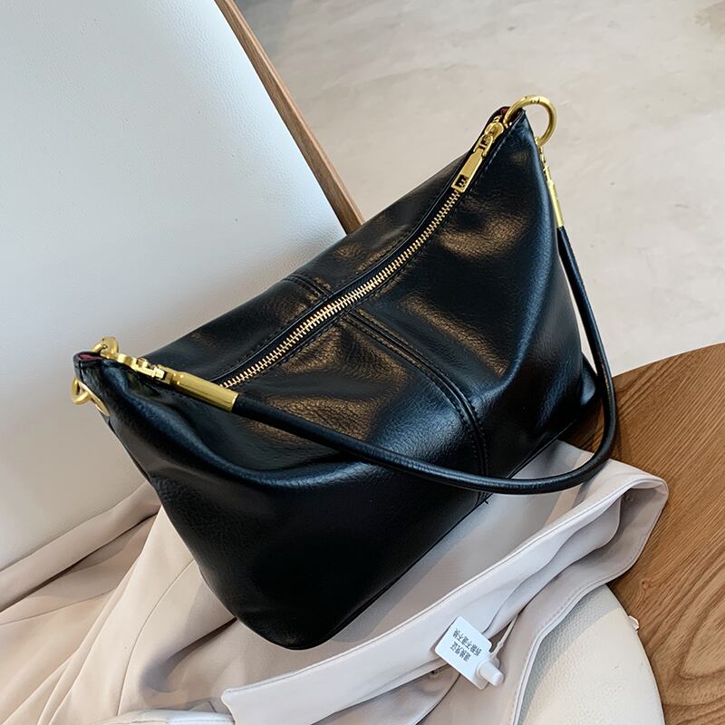 シンプルな大容量バッグ女性2020新しい流行の秋と冬のレトロなワンショルダーアンダーアームバッグ野生の大学生のclバッグ Tiancai_Wing_Bag87018926481