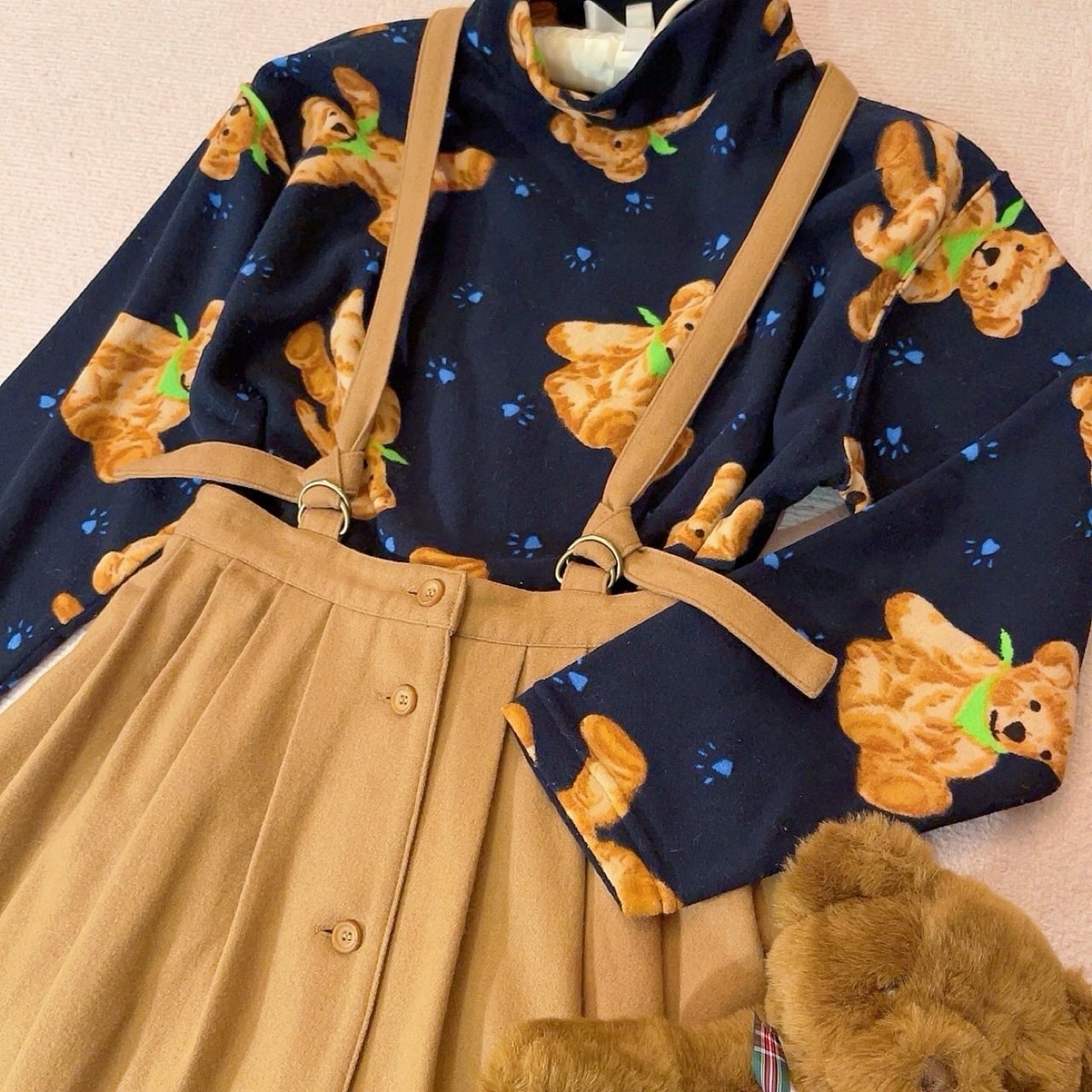 beige front button suspender skirt