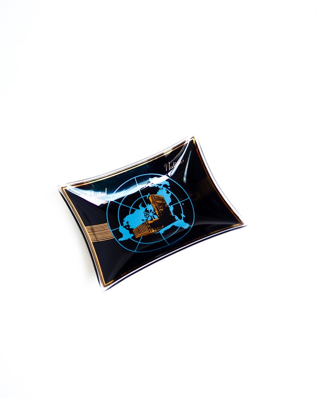 vintage tray from the United Nations made of smoky black glass tray