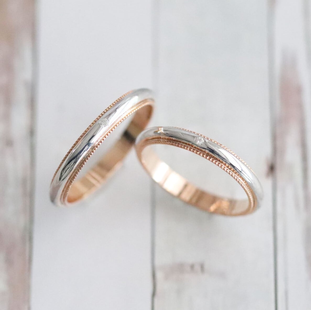 【結婚指輪】甲丸_ダブル2カラー_ミルグレイン_ベース3.0mm_ダイヤモンド1P_Pt900×K18PG