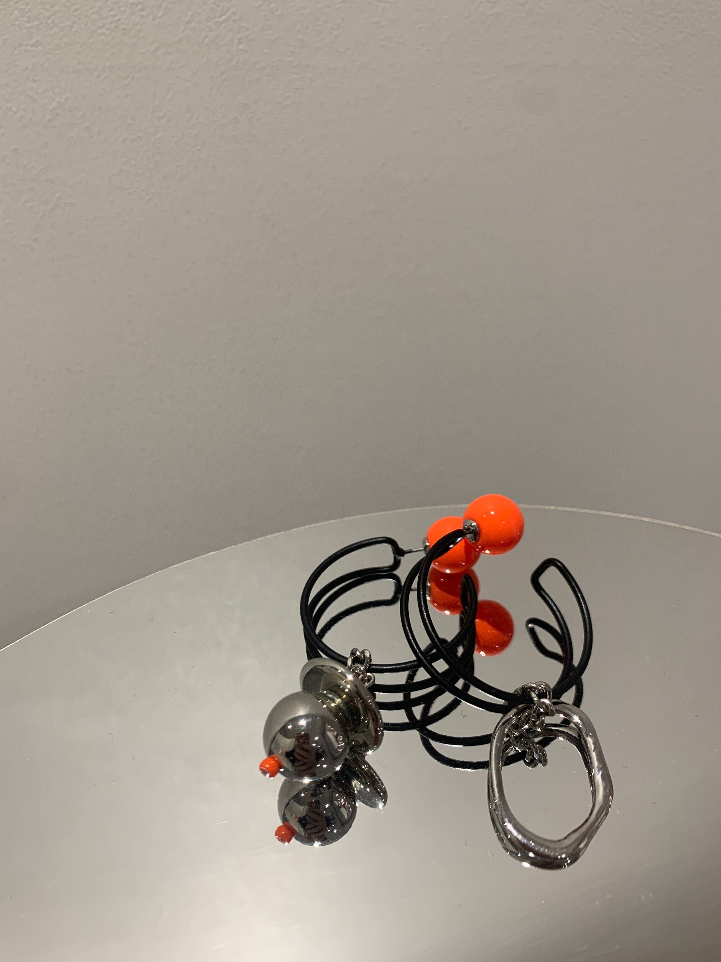 mad black hoop oval metal asymmetry