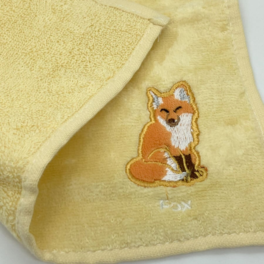 キツネのタオルハンカチ にっこりキツネさん イエロー | きつねの雑貨