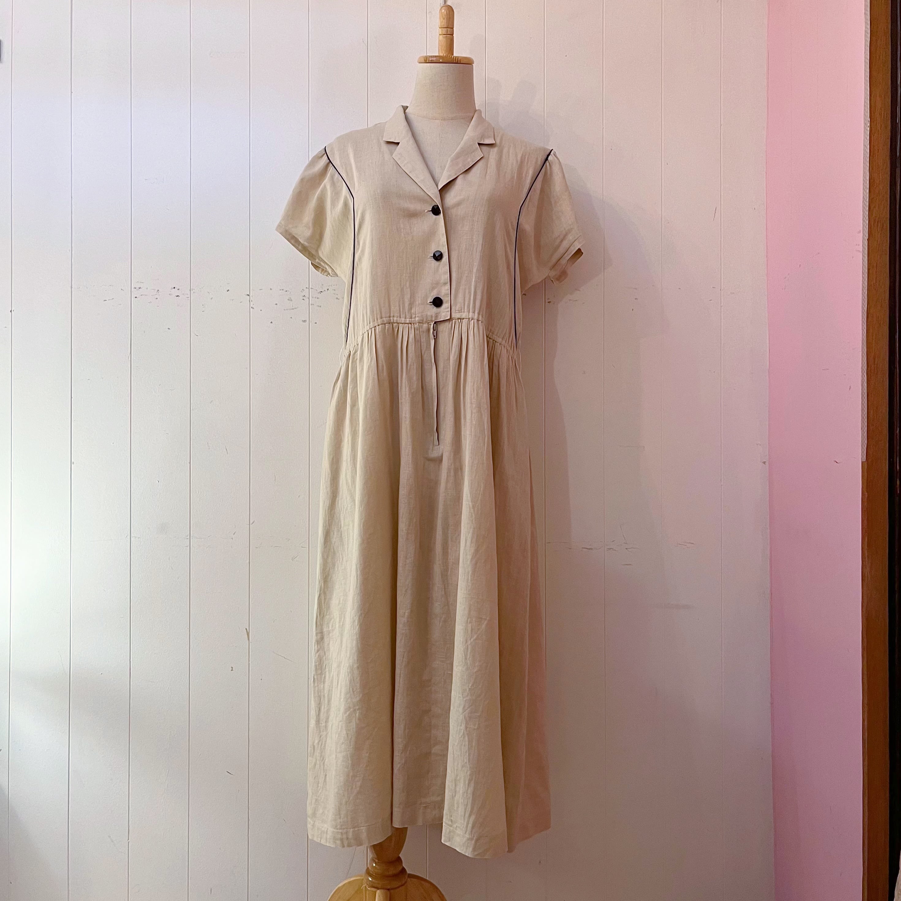 beige open collar one-piece