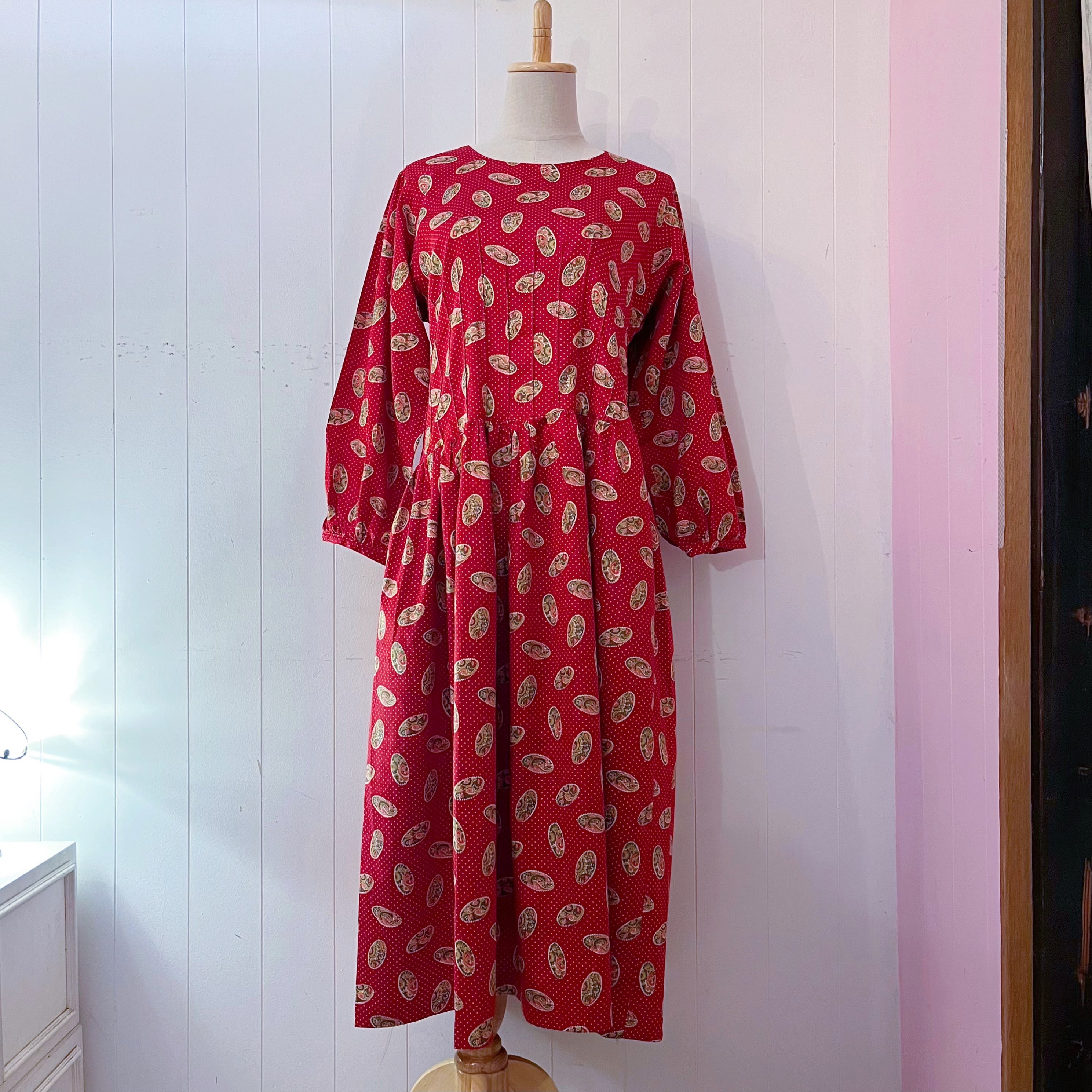 red paisley dot back button one-piece