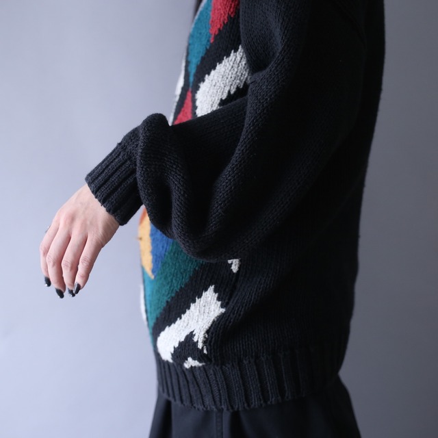 multi color art pattern over silhouette knit