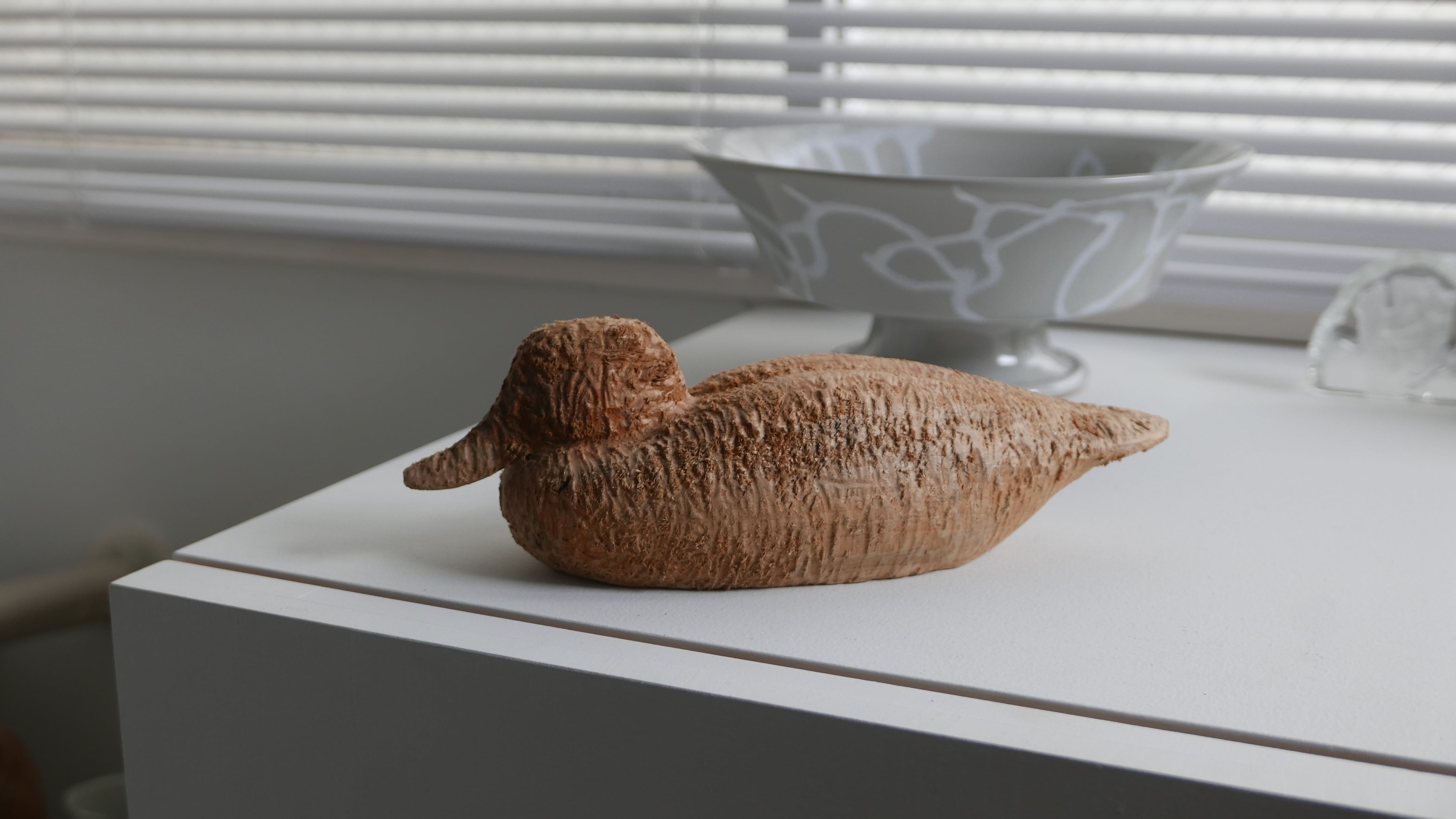 wooden decoy , unfinished