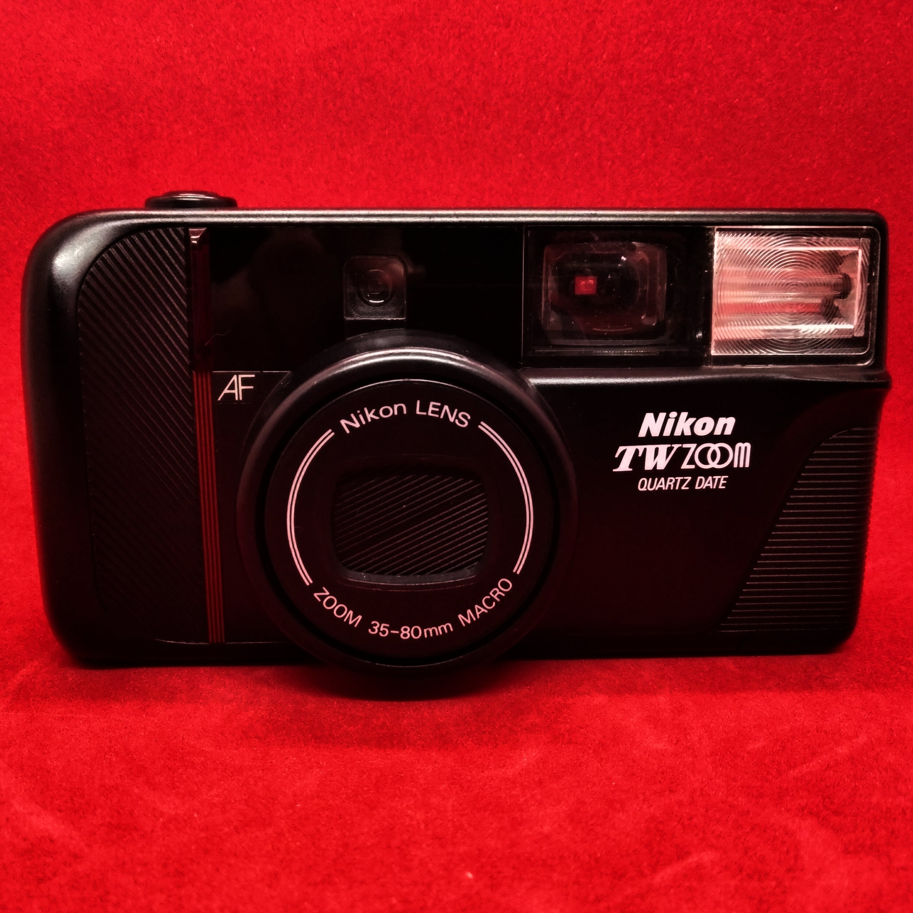 品多く Nikon ニコン TW ZOOM QUARTZ DATE 35-80㎜ フィルムカメラ ケース付き ジャンク品 通電確認済み 現状発送  保証無し