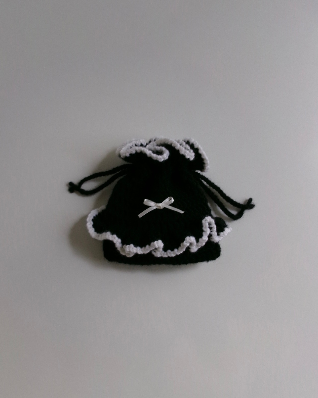 frill drawsring bag