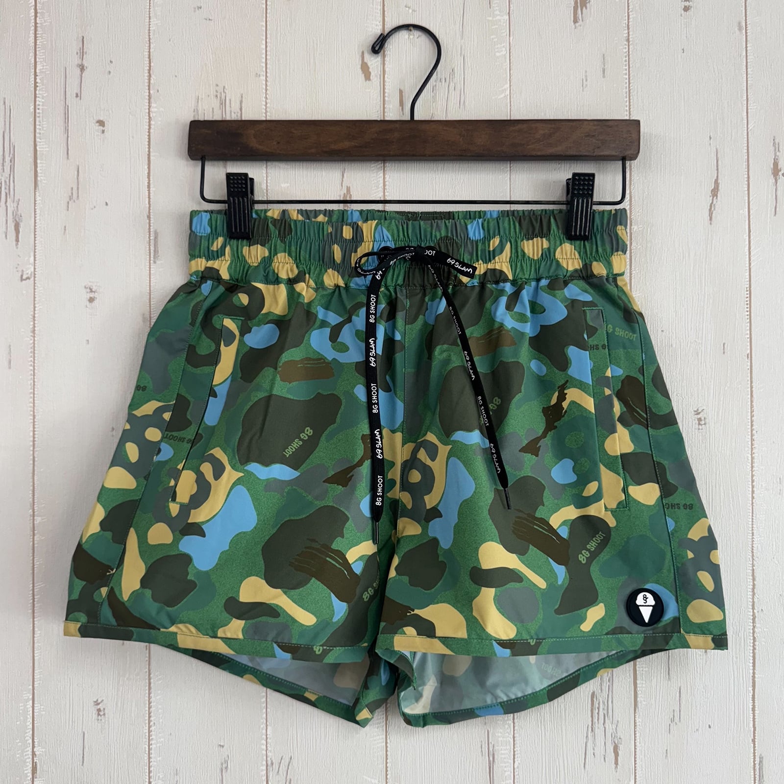【WOMEN'S】 8G SHOOT ×69slam ALOHA SHORT PANTS -GREEN CAMO-