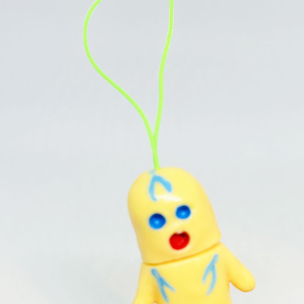 チビめんたストラップ(うすきいろ） / ストラップ / デハラユキノリ