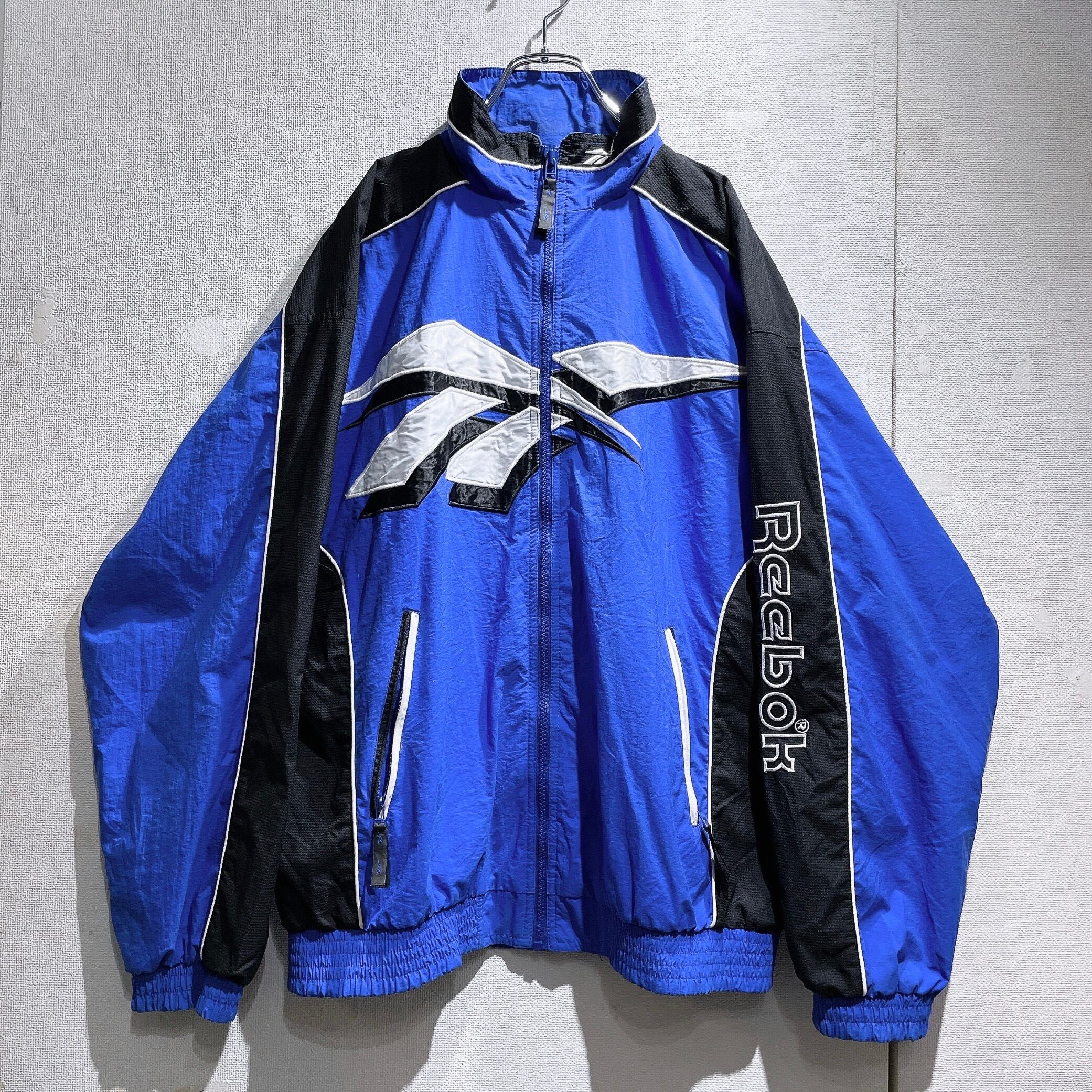 1990s ” Old Reebok ” Big vector logo Embbossed vintage Track jacket
