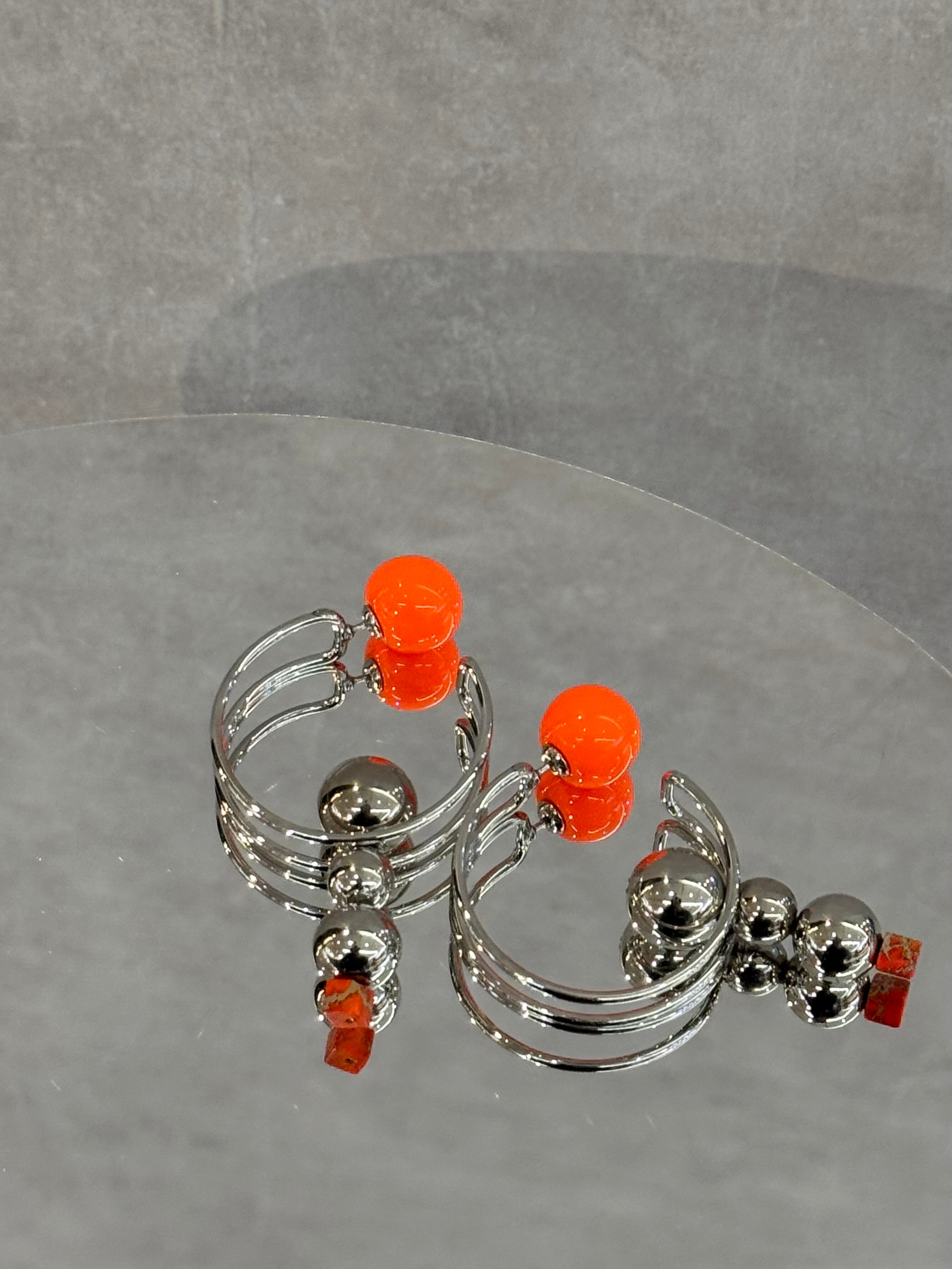 double hoop swinging ball silver