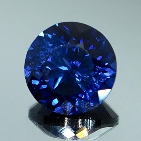 メタリックブルーの凍てつくような輝き 0.66ct 天然 アイスブルー