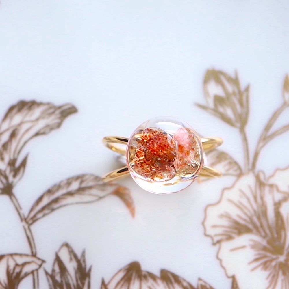 サンストーン オレンジ ラウンド ダブルクロス リング レジン まる