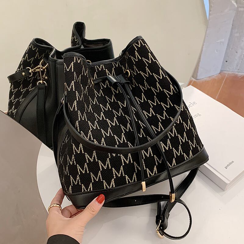 大容量バッグレディース2020新しいトレンディなオンラインセレブワイルドトートバッグショルダーメッセンジャーバッグファッションバケットバッグ Tiancai_Wing_Bag90513577604