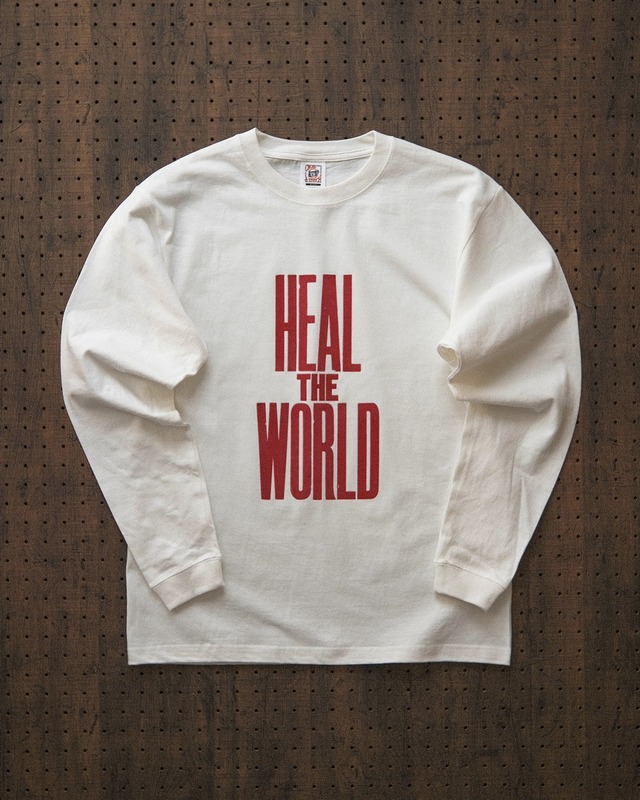 "heal the world" long sleeve tee in off white（受注生産）/ UNICEF寄付対象商品