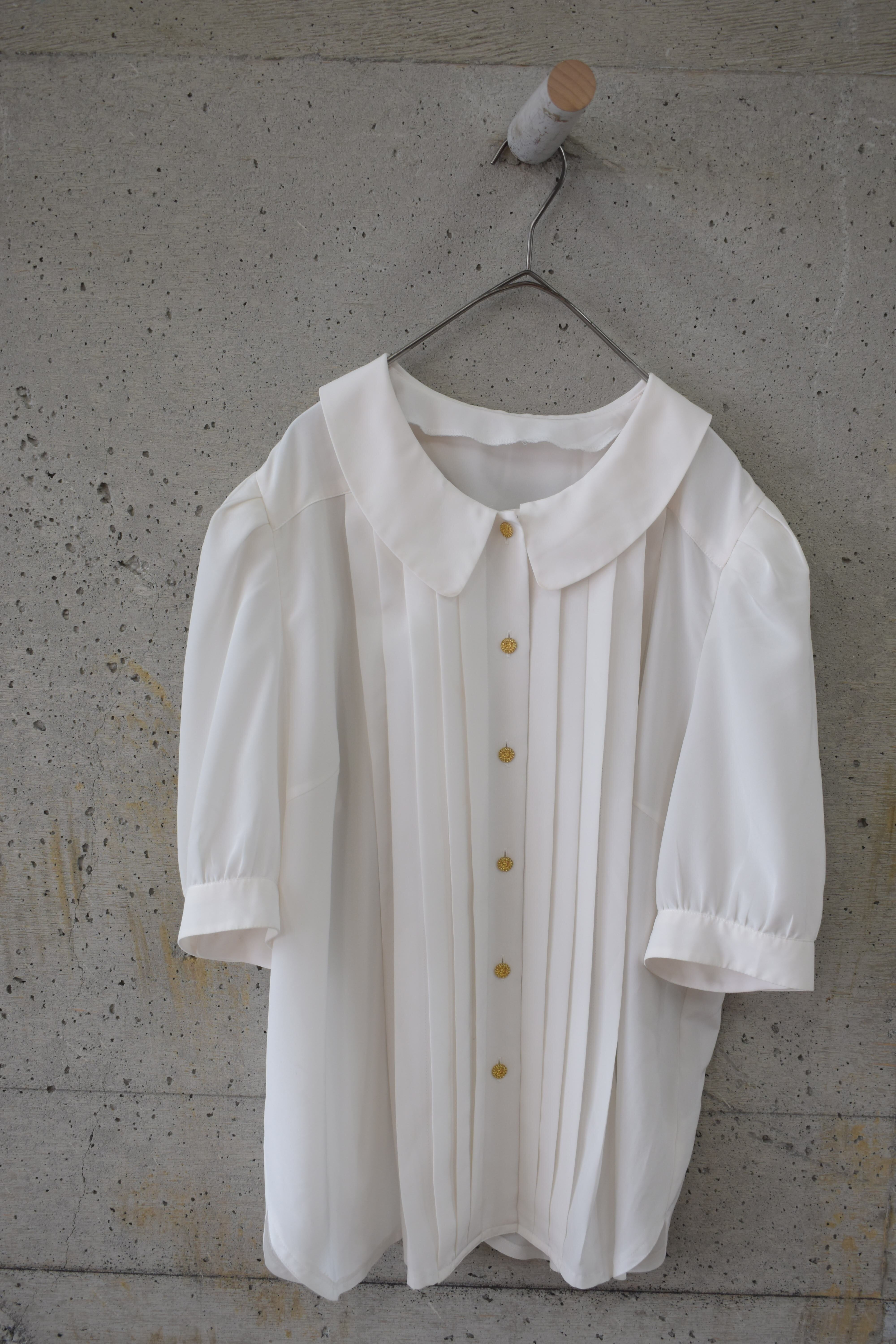 White tucked blouse