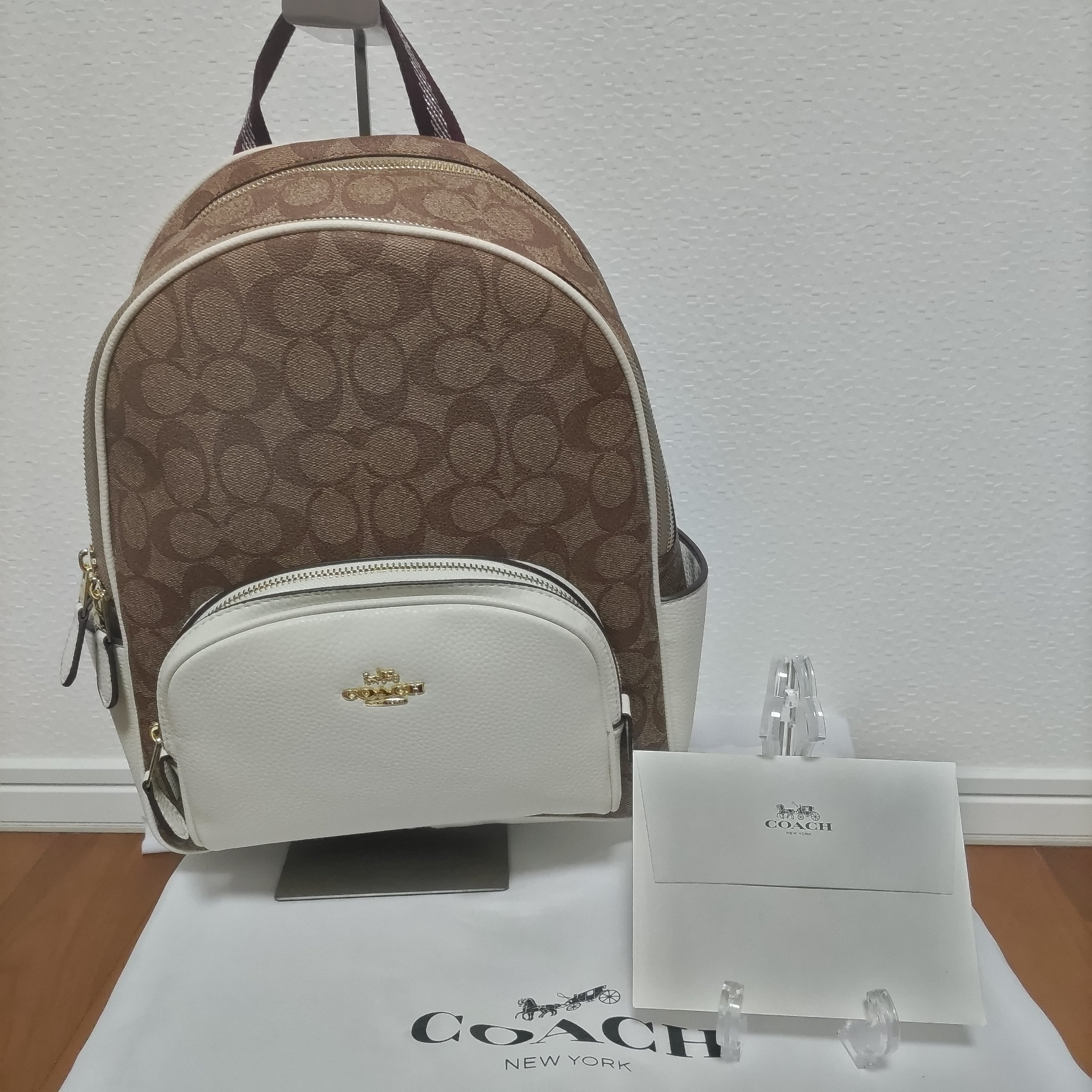 COACHリュックバックシグネチャー茶×ホワイト