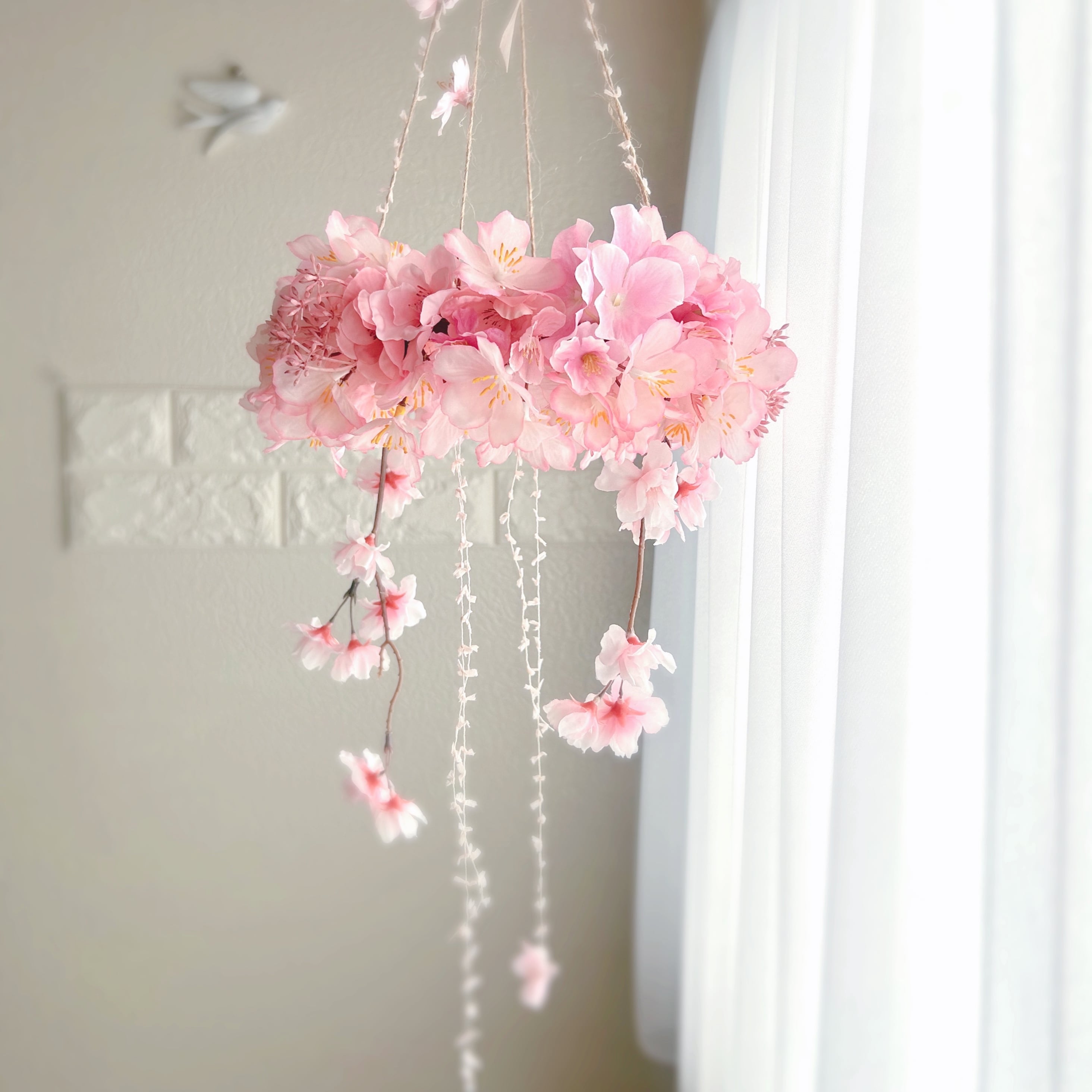 再販】桜ピンクのフライングリース/フラワーギフト/アーティフィシャル