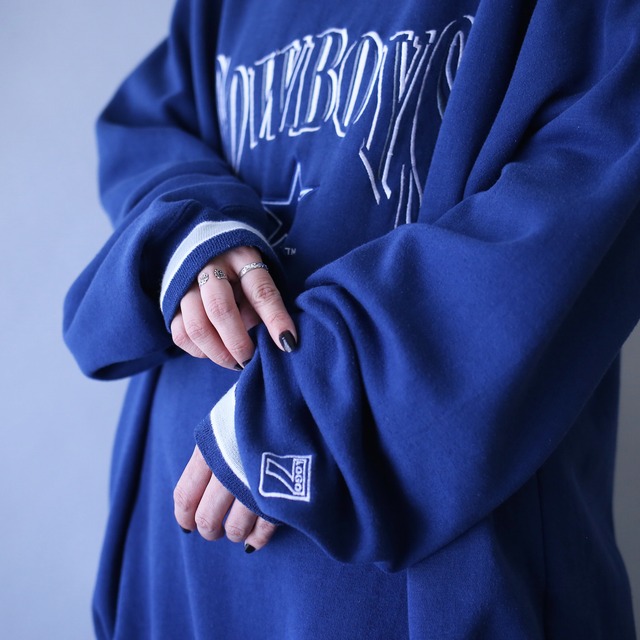 "刺繍" COWBOYS logo design over silhouette sweatshirt