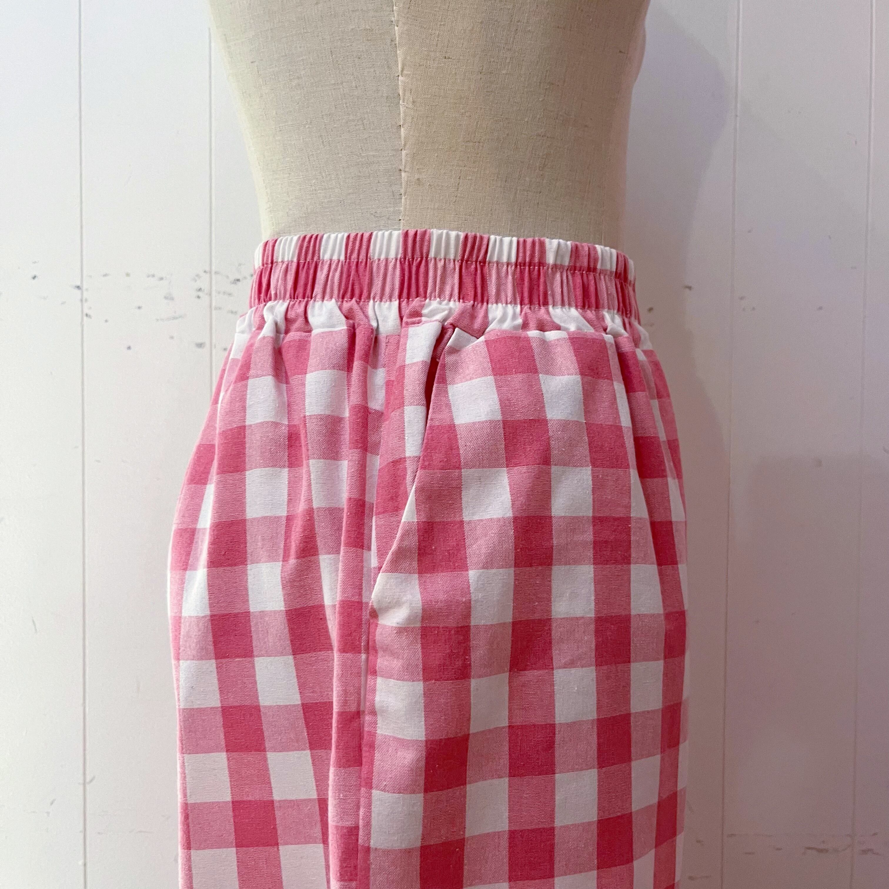 pink block check pants