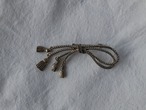 Vintage rope and tassel motif brooch