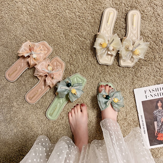 純赤いサンダルとスリッパの女性は2020年の新しい春と夏のちょう結びのファッションフラット底のつま先のビーチワードドラッグ潮を着用します 部族の婦人靴2003829