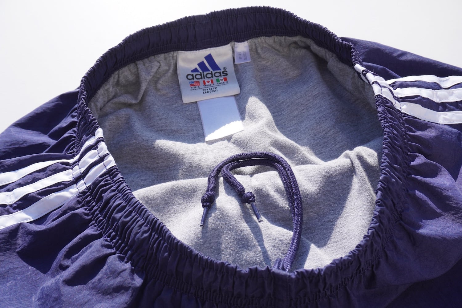 90s old adidas 万国旗タグ バギーナイロントラックパンツ ネイビー 1990's [adidas] 万国旗タグ 3ストライプス&パフォーマンスロゴ