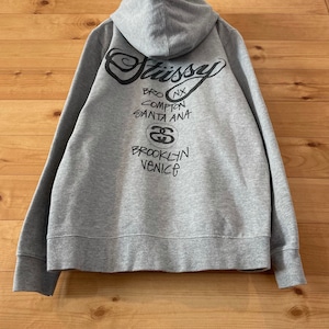 【STUSSY】USA製 WORLDTOUR スウェット プルオーバー パーカー ワンポイント バックプリント アメリカ古着