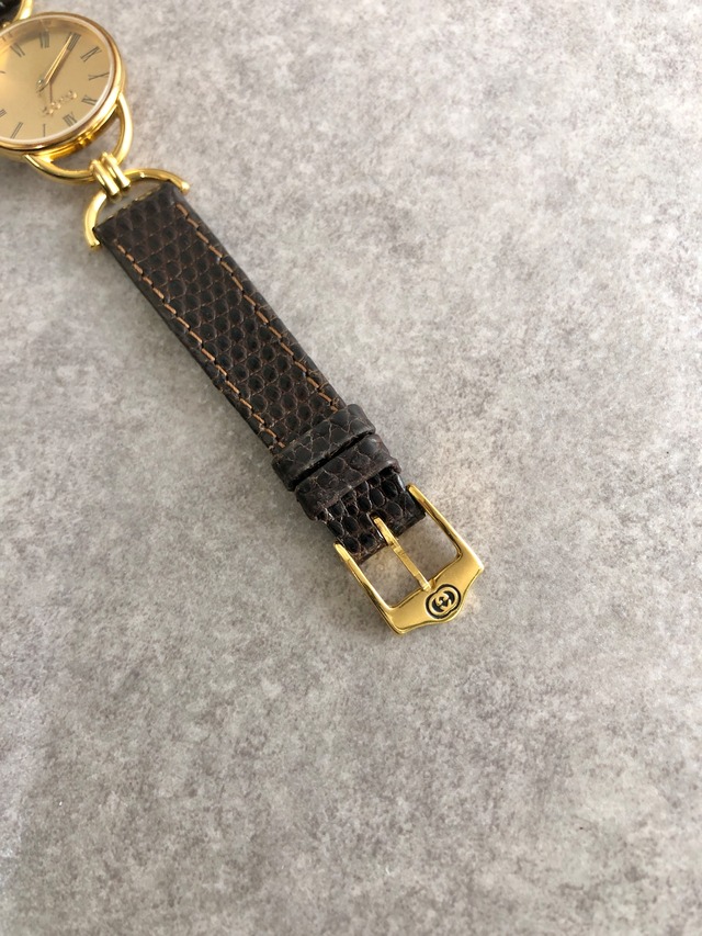 GUCCI グッチ 腕時計 ゴールド×ブラック ローマ文字 レザー 6000.2.L vintage ヴィンテージ オールド 6tkgex