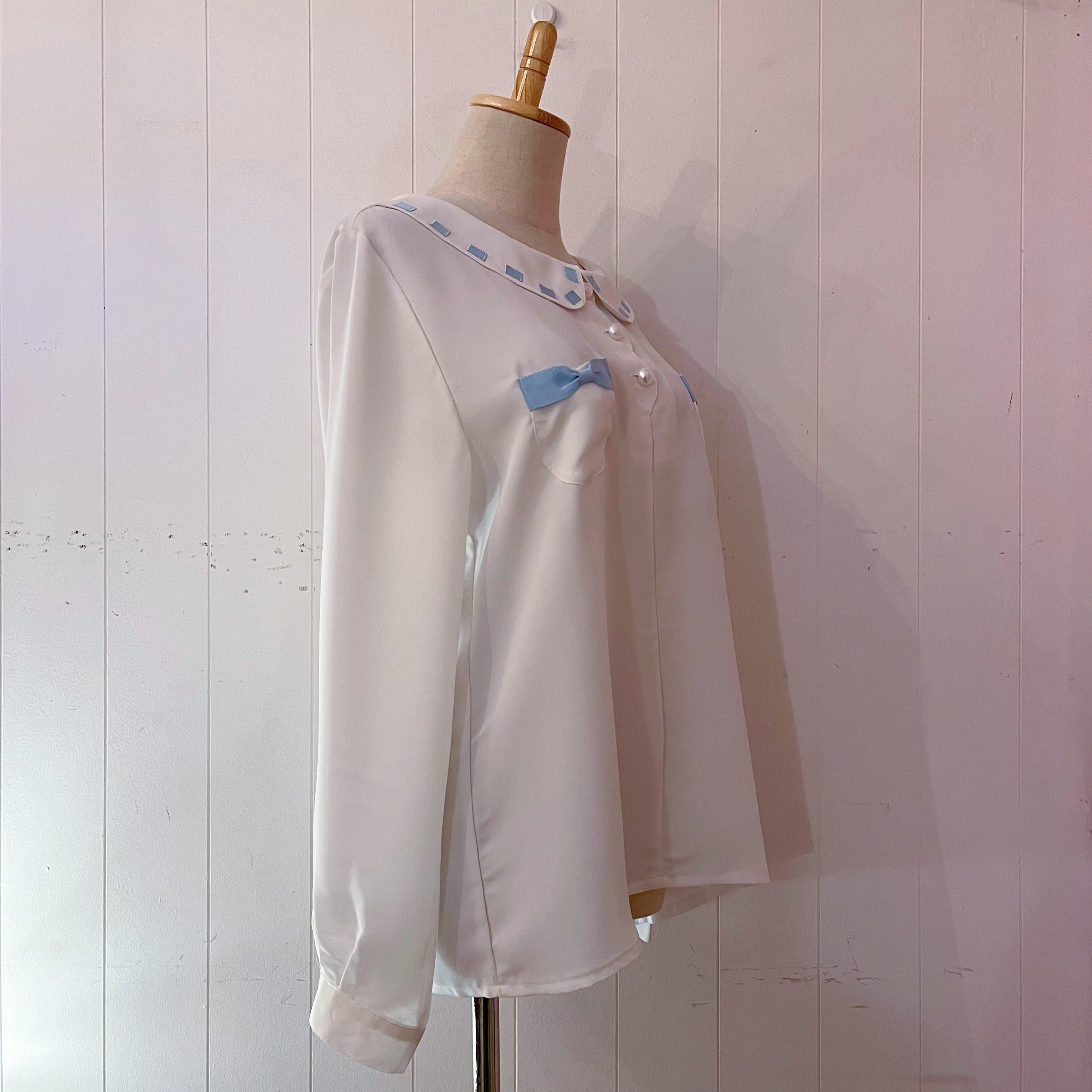 light blue ribbon white blouse