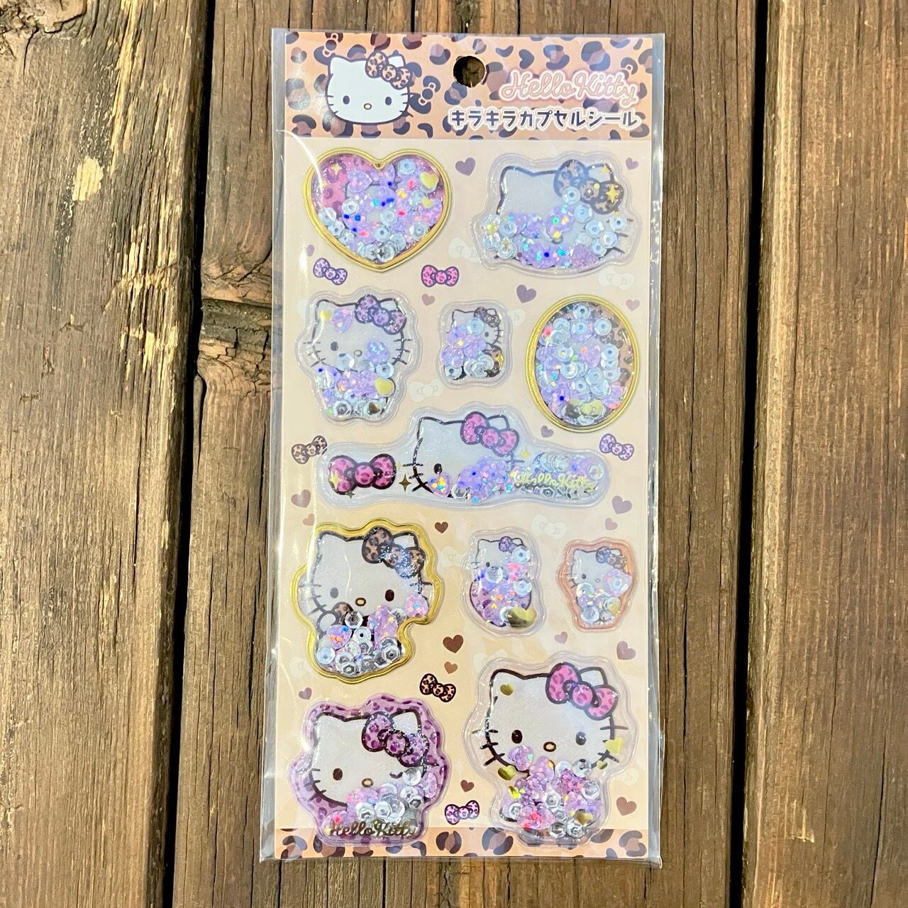 サンリオ ハローキティ ヒョウ キラキラカプセルシール X12