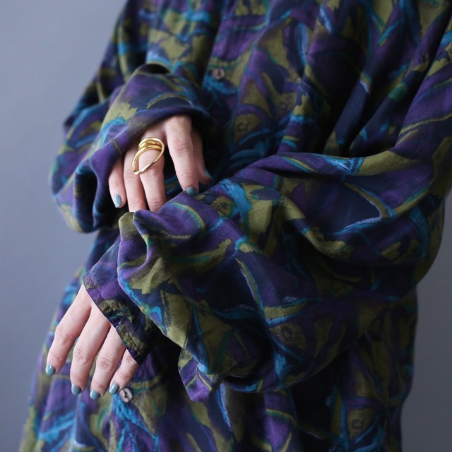 poison color abstract painting pattern over silhouette silk shirt