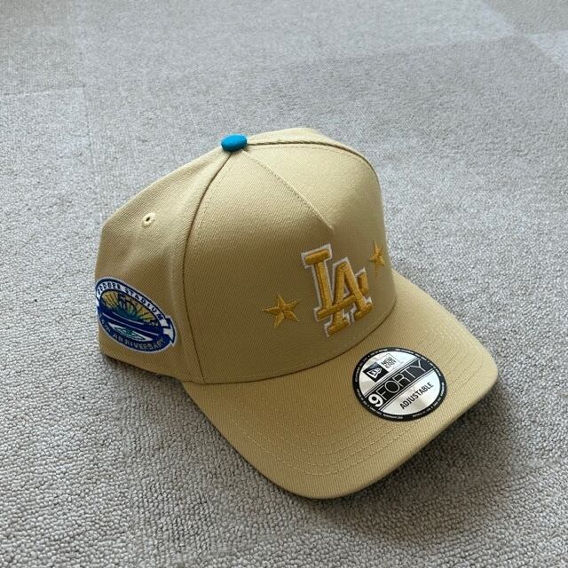 NEW ERA LOS ANGELES DODGERS 50TH ANNIVERSARY GOLDEN STARS EDITION 9FORTY A  FRAME SNAPBACK